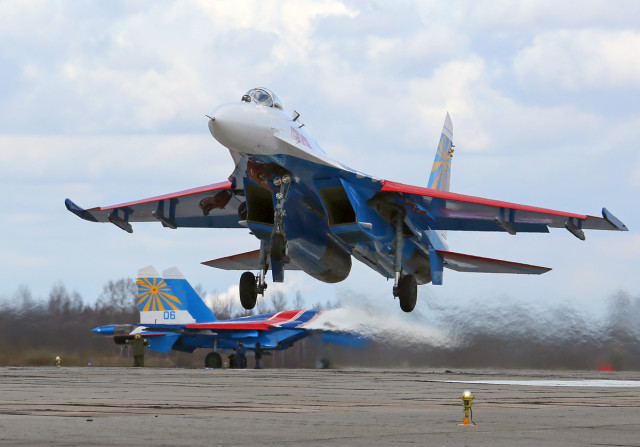 Sukhoi Su-27 of Russian Knights of Russian Airforce at Pushkin airbase (ULLP). Brake parachute drop. Saint-Petersburg, Russia. (Photo by Fyodor Borisov/Transport-Photo Images)