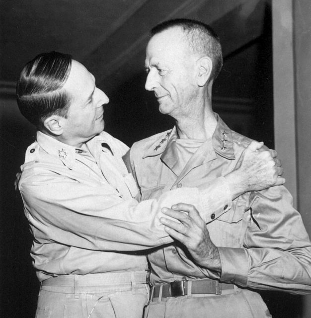 Wainwright (right) and MacArthur greet, August 1945.