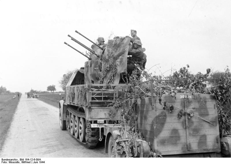 Quad Flak Gun in Normandy -  Juni 1944 <a href=https://commons.wikimedia.org/wiki/Category:Images_from_the_German_Federal_Archive
>Photo Credit</a>