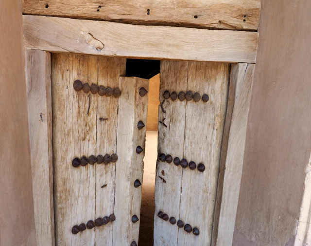 Heavy entrance door Jabreen Castle and Palace. Oman Forts April 2016 Picture by: © www.thetraveltrunk.net