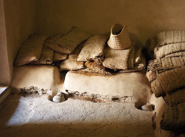 Date storage with oil collection pots Nakhal Fort. Oman Forts April 2016 Picture by: © www.thetraveltrunk.net