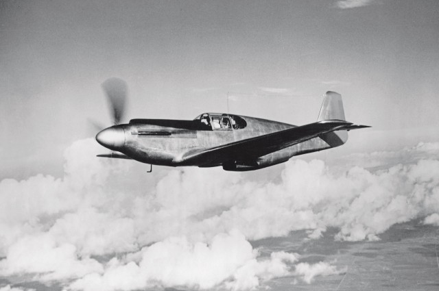 Putting proper grammar aside, they say that if an airplane looks good, it flies good, too. This image shows the clean lines of the NA-73 after it was rebuilt. Note that for some reason, the airplane’s striped tail has been touched out of the print. National Archives