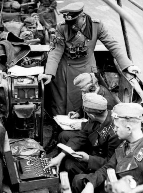 Heinz Guderian in the Battle of France, with an Enigma machine. Photo Credit.