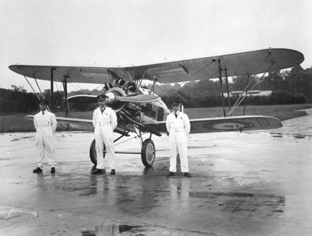 Bader, Fl.Lt. Harry Day and Fl.Off. Geoffrey Stephenson during training for the 1932 Hendon airshow, with a Gloster Gamecock.