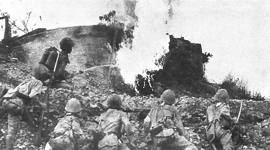 Japanese flamethrower in action against a bunker on the Orion-Bagac Line.