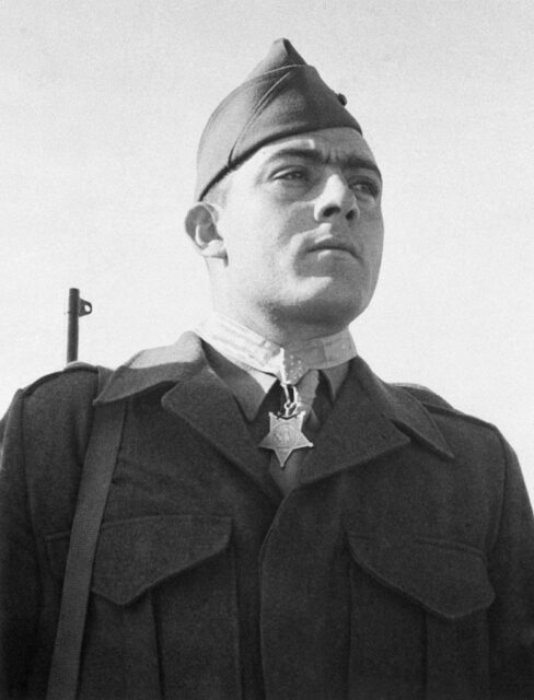 John Basilone wearing the Medal of Honor around his neck