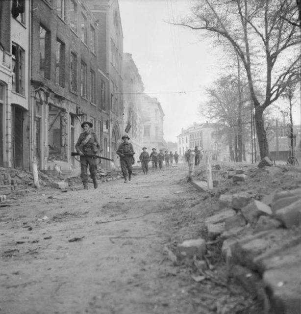 Troops patrol the city, 14 April.