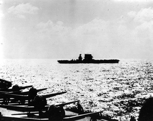 Yorktown (foreground) and Lexington turn to launch under clear skies on 8 May.