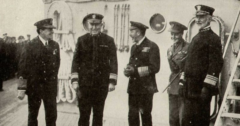 King George V and his son the Prince of Wales visiting the Grand Fleet in 1918. From left to right: Admiral David Beatty, RN; Rear Admiral Hugh Rodman, USN; King George V; Prince of Wales; Vice Admiral William S. Sims, USN.