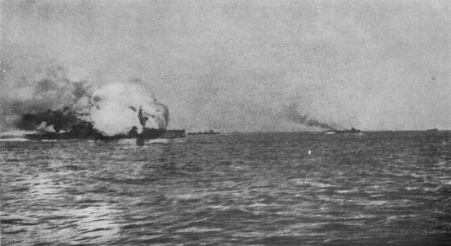 Invincible blowing up after being struck by shells from Lützow and Derfflinger. By unknown. Taken from a destroyer nearby. - Fighting at Jutland:The personal experiences of forty five officers and men of the British Fleet. London Hutchinson and Co, Ltd. 1921. Also available online at internet archive [1], PD-US