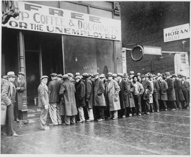 Unemployed men outside a soup kitchen opened by Al Capone in Depression-era Chicago, Illinois, the US, 1931.