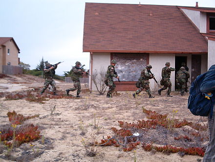 A photo taken during a “Secrets of Fort Ord” Tour, with soldiers training, 2007