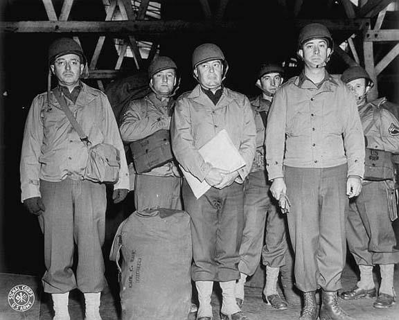 Jacket, Field, OD worn by soldiers shipping out, World War II.