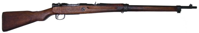 A Type 99 Short rifle made after mid-war (also known as the Type 99 "last ditch" rifle). The rifle has no flip-up anti-aircraft rearsight nor monopod. By adamsguns.com - http://www.adamsguns.com