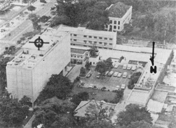 Aerial view of the US Embassy, Saigon, showing Chancery building (left), parking lot (center) and Consulate compound and French Embassy (top)