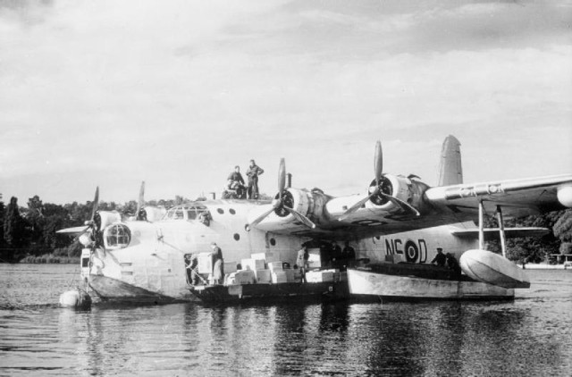 An RAF Short Sunderland moored on the Havel near Berlin unloading salt during the airlift