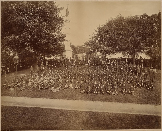 In this May 31, 1886, image, soldiers from the John A. Andrew Post 15 of Massachusetts and the George G. Meade Post 38 of New York gather at the Soldiers and Sailors Monument on Boston Common for Memorial Day. Picture by Elmer Chickering, courtesy of Boston Public Library.