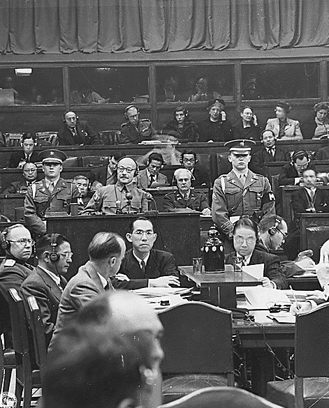 Tojo before the International Military Tribunal for the Far East. By Unknown - NRE-338-FTL(EF)-3161(12), Public Domain.
