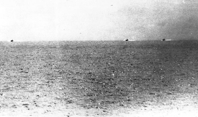 "Photograph taken from USS Maddox (DD-731) during her engagement with three North Vietnamese motor torpedo boats in the Gulf of Tonkin, 2 August 1964. The view shows all three of the boats speeding towards the Maddox."By US Navy sailor aboard USS Maddox - Moved to Commons from en-wiki.Official U.S. Navy Photograph, from the collections of the Naval Historical Center.Photo # NH 95611, Public Domain, 