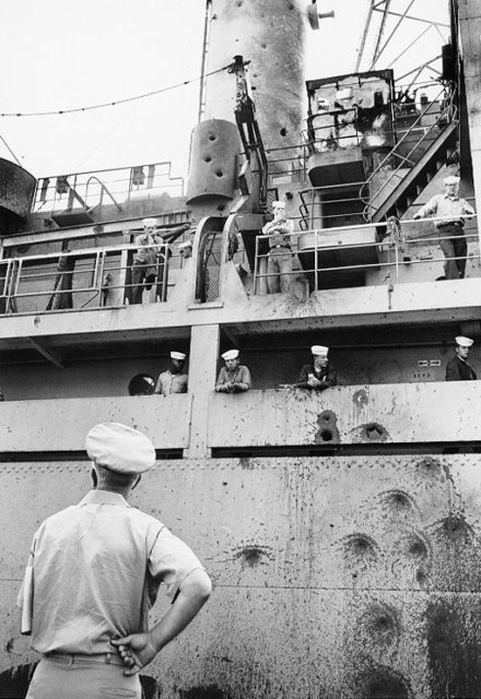 Amidships starboard hull and superstructure attack damage.