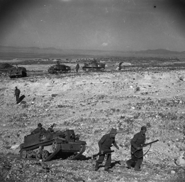 British soldiers of the 2nd Battalion, Grenadier Guards establishing positions on difficult terrain at Thala, 24 February 1943.