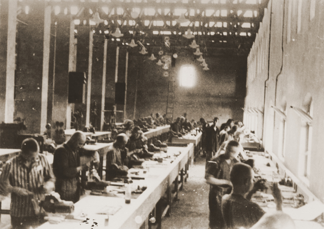 Prisoners around 1944 working at a Siemens factory in KZ Bobrek, a subcamp of Auschwitz concentration camp.