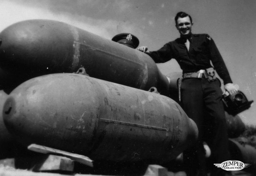 Duane Zemper posing with a group of 500 pounders
Source: Zemper Collection, the 457th Bomb Group Association
