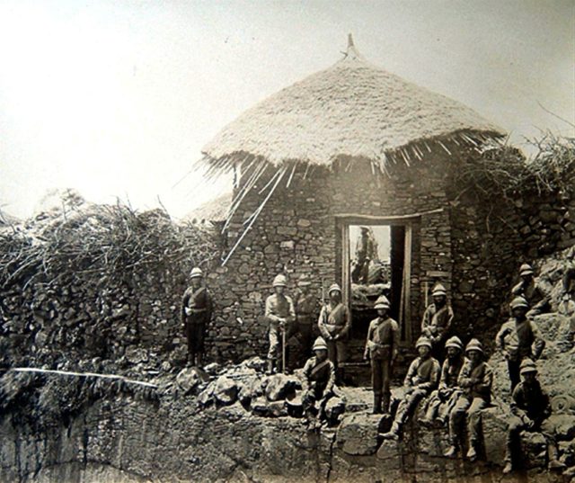 British troops posing at a captured sentry post above Koket-Bir gate at Magdala fortress.