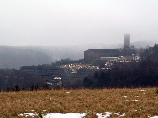 View to the Ordensburg from the former town of Wollseifen. Photo Credit.