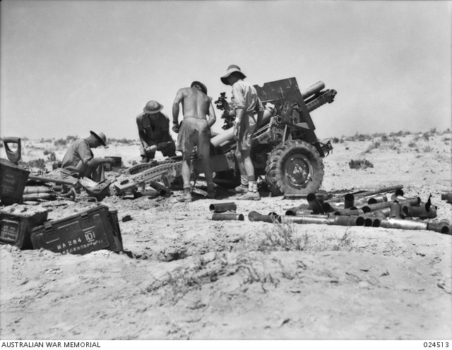 Gunners of 2/8th Australian Field Regiment firing a 25-pounder during the battle of El Alamein.