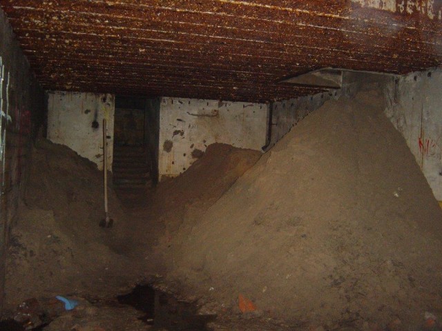 An audit office with a big pile of sand.