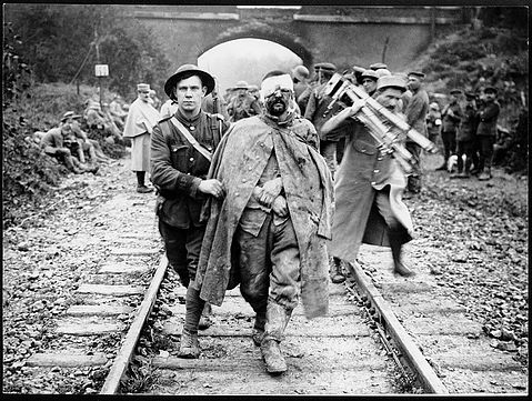 'A Boche prisoner, wounded and muddy, coming in on the 13th.'