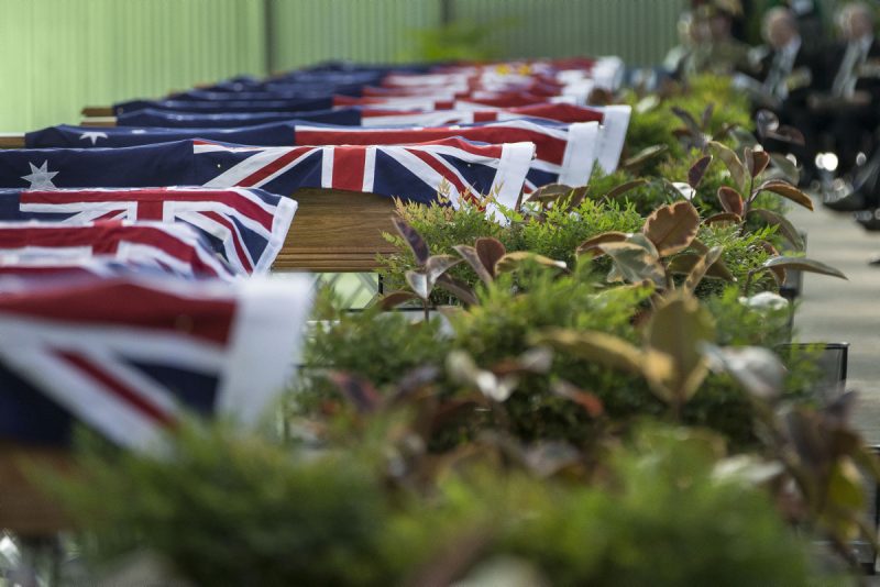 Family and friends of the 33 Australian service personnel and dependants attend a memorial service as part of the repatriation ceremony at RAAF Base Richmond in Sydney on Thursday, 02 June 2016.