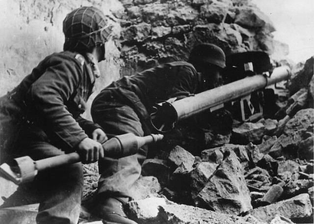 Panzerknacker team hunts Allied armor with a Panzerschreck (Image).