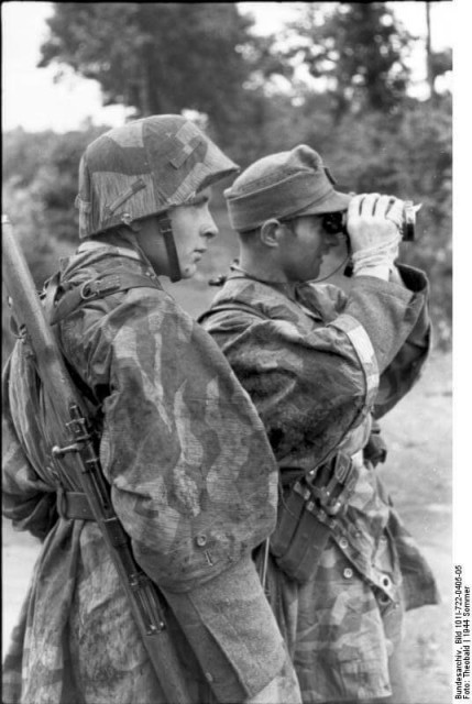 German soldiers are looking out, Normandy, 1944 (Image).
