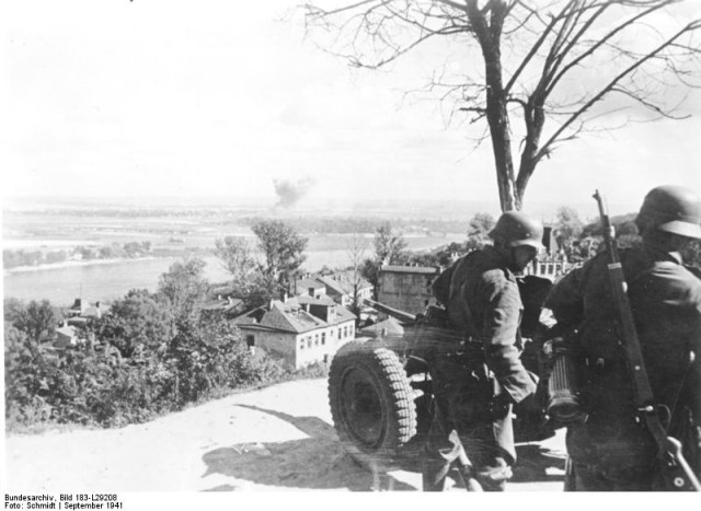 German soldiers shoot the Soviet positions on the other side of Dniepr River with anti-gun PaK 36. 20 September 1941