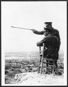 'Commander explaining the capture of Thiepval to H.M. from the top of the Thiepval Chateau.'