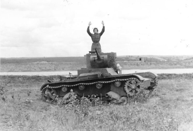 Soviet soldier surrender himself and his tank T-26 to Germans after battle Raseiniai