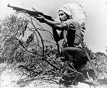 A Menominee Chief seen training in Louisiana in 1943. Photo via Wikipedia 
