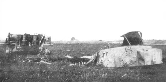 Photograph of the wrecked Tiger 007, taken by French civilian Serge Varin in 1945, still in the field near Gaumesnil where it had been stopped a year before. 