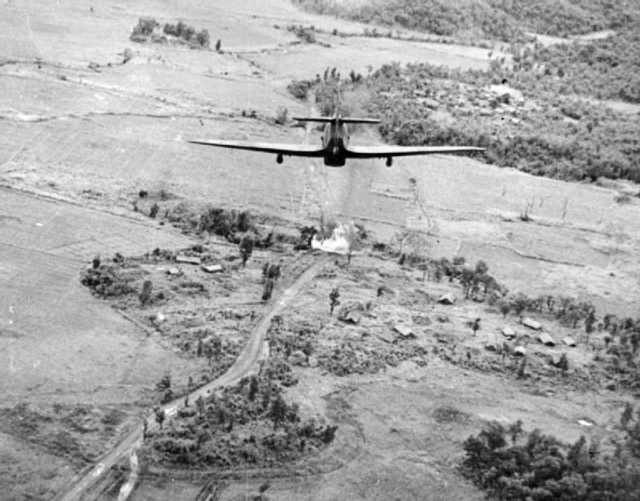 A Hawker Hurricane attacks a Japanese position.