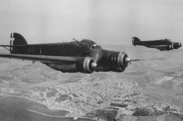 Two bombers Savoia Marchetti S.M. 79 of the Regia Aeronautica flying over the southern coast of Sicily. 1943.[Archive photo of Riggio family., CC BY-SA 3.0]