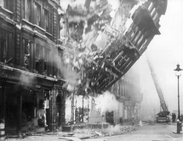 Collapsing walls of a building in London after bombing. [Via]