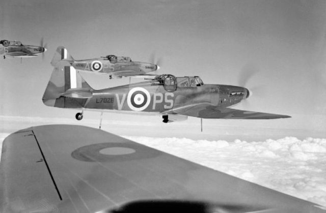 Defiant Mark Is, including L7026 ?PS-V? and N1535 ?PS-A?, of No. 264 Squadron RAF based at Kirton-in-Lindsey, Lincolnshire, in flight. (PS-V was shot down on 28 August 1940 over Kent by Bf 109s) [© IWM (CH 884)]
