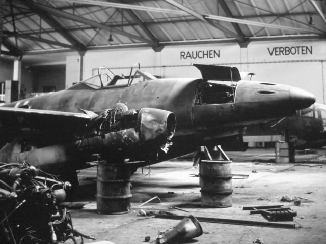 Damaged German fighter Messerschmitt Me-262, captured by US troops in Salzburg. The engine fighter set the German anti-tank mine Tellermine 42 (T.Mi.42). Presumably, the machine has been prepared to undermine