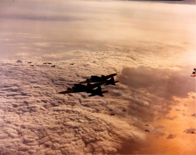 B-17 Fortresses of the 91st Bomb Group nearing the Dornier Assembly Plant at Meulan, France at dawn, Aug 13 1943 (United States National Archives)