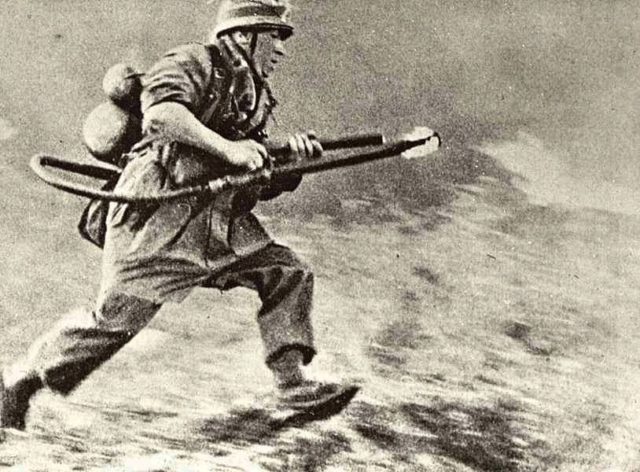 German Paratrooper with flamethrower during the invasion of Crete [Public Domain].