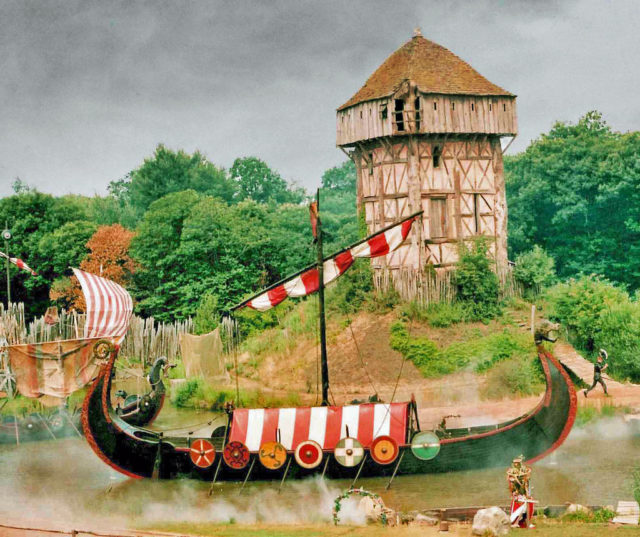 A Viking longship raids a village in this display at the Puy du Fou historical theme park in Vendée, France. Photo by DncnH / Flikr / CC BY 2.0 