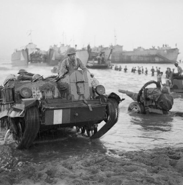 A British Universal Carrier Mark I comes ashore during the invasion of Sicily on 10 July 1943. [© IWM (NA 4183)]