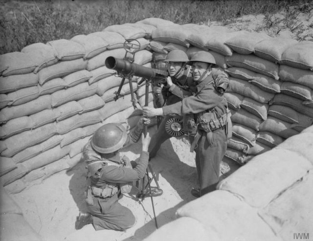 Gunners of 177 Heavy Battery, Royal Artillery, man an anti-aircraft Lewis gun at Fort Crosby near Liverpool, England, 1 August 1940. This operation formed part of British preparations to repel the threatened German invasion of 1940. [© IWM (H 2695)]